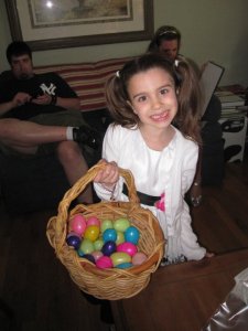 Juliet, my 5-year-old cousin, beating me in the annual Easter egg hunt.